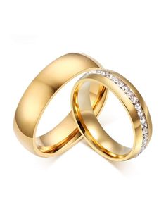 two gold wedding rings with white diamonds on each one and the other in between them