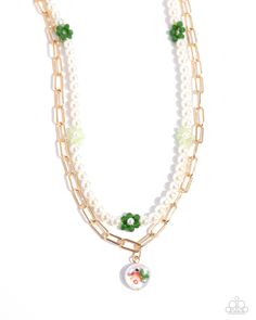 Painted Pageantry Green Necklace - Paparazzi Accessories Infused along an invisible string, glossy white pearls, haphazardly interrupted by pearl-centered green and light green flowers, loop around the neckline for a refined statement. Gold paperclip chain links layer below the pearly strand, leading the eye to a solitaire baroque pearl painted in multicolored floral detailing, for a spring-inspired spot of color and whimsy. Features an adjustable clasp closure. Sold as one individual necklace. Includes one pair of matching earrings. P2WH-GRXX-406XX