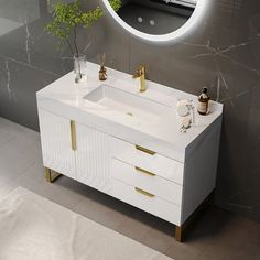 a white sink sitting under a round mirror