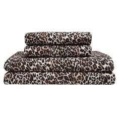 the leopard print sheets are folded on top of each other