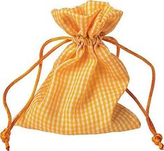 an orange and white checkered bag on a white background