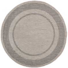 a round rug with an oval design on the center, in grey and white colors