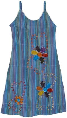 A true statement piece, this cotton dress has the right notes for the perfect fashion statement. With its cool-toned blue striped look, the dress has a soothing effect, and the smocked back with adjustable straps makes the fit just right. #tlb #Embroidered #Applique #Floral #Striped #bohemianfashion #Floraldress #Summerdress #kneelengthdress #cottondress Blue Cotton Lined Sundress, Cotton Lined Sundress, Blue Summer Cotton Dress, Lined Cotton Sundress, Blue Cotton Sundress For Summer, Blue Cotton Summer Sundress, Blue Cotton Short Sleeve Sundress, Blue Cotton Dress For Vacation, Blue Cotton Summer Dress