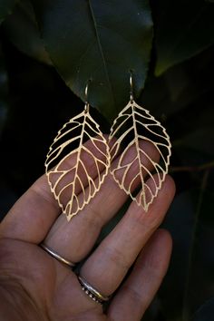 Delicate Skeleton Leaves dangle and dance gracefully from your ears. These earrings are large, yet very lightweight and easy to wear for any autumnal occasion and beyond. These leaves are made from raw (not plated) brass with an added texture and sterling silver ear hooks. Be sure to check out my Maple leaf necklace to match! See last photos. Each earring is approximately 2 1/2 inches long including the ear hook and weighs only .05 oz (1.2 g) ✦ C A R E - I N S T R U C T I O N S ✦ Each creation i Butterfly Museum, Maple Leaf Necklace, Ladybug Jewelry, Rain Earrings, Skeleton Leaves, Leaf Skeleton, Autumn Earrings, Autumn Jewelry, Leaf Earring