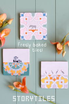 three small ceramic tiles with flowers on them and the words, freshy baked tiles