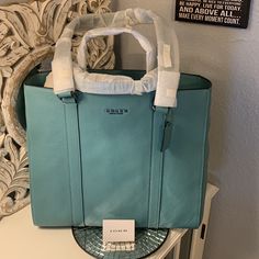 Nwt. Blue/Green. Perfect For Travel Or Everyday On The Go!!!! Measurements: 13.75(L)X5.25(W)X12.5(H). Handle Drop: 4.75(Short), And 10.25(Long). Luxury Light Blue Office Bag, Designer Blue Satchel For Travel, Designer Light Blue Bags For Everyday, Light Blue Top Handle Bags For Office, Luxury Turquoise Travel Bags, Light Blue Tote Satchel For Shopping, Designer Light Blue Tote Shoulder Bag, Designer Light Blue Shopping Bag, Elegant Light Blue Travel Satchel