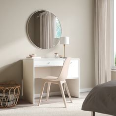 a bedroom scene with focus on the desk and mirror