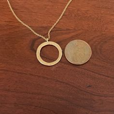 Just Got This And It Is In Perfect Condition. The Only Reason I’m Selling Is Because It Is Too Similar To Another That I Already Own. Solid 14k Gold Circle Pendant And Chain. Pendant Is Approx .75” In Diameter. Chain Has Options To Be Worn 18” Or 16” Long. Very Lightweight And Easy To Wear - You Won’t Even Know You Have It On! The Open Circle Is For The New Moon And A Time Of New Beginnings. Wear With Love! Elegant Full Circle Hammered Jewelry, Sterling Silver Open Circle Jewelry In Yellow Gold, Gold Circular 14k Gold Necklace, Elegant Hammered Open Circle Jewelry, 14k Yellow Gold Circle Necklace, 14k Gold Circular Jewelry, Tarnish Resistant Yellow Gold Circular Jewelry, 14k Yellow Gold Circular Jewelry, Fine Jewelry In Gold With Open Circle Design