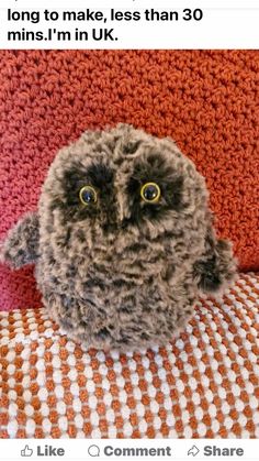 an owl sitting on top of a couch