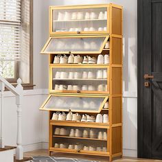 a tall wooden shelf filled with lots of containers