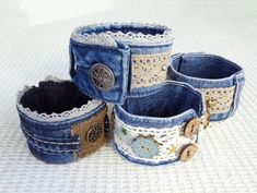 four denim cuff bracelets with lace and buttons