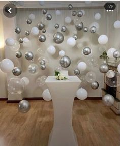 an image of a room decorated with balloons