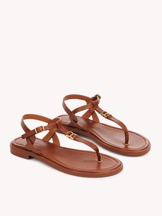 Chloé Marcie Sandal | Chloé US Elegant Slingback Sandals With Buckle For Vacation, Elegant Leather T-strap Sandals For Vacation, Elegant Slingback Sandals With Leather Footbed For Beach, Elegant Beach Slingback Sandals With Leather Footbed, Elegant T-strap Sandals With Buckle Closure For Vacation, Chic Flat T-strap Sandals With Buckle Closure, Elegant Sandals With Leather Lining For Vacation, Elegant T-strap Sandals With Leather Footbed For Summer, Elegant Flat Sandals With Adjustable Strap