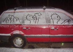 a red van covered in snow with the words meanwhile in wisconsin written on it