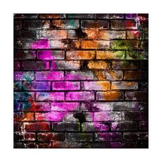 an old brick wall painted with multicolored paint