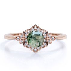 Captivating by itself, this 1.10 Carat Vintage Design 4 Prong Round Shape Milky White Druzy Moss Green Agate And Moissanite Floral Cluster Engagement Ring In 18K Rose Gold Plating Over Silver can serve as a splendid unique gift for your mom, grandma, girlfriend, fiance, wife, daughter, close friend, or anyone on special occasions. Made up of durable, authentic 18K rose gold plating over silver, this vintage design engagement ring combines 1 carat 4 prong round shape milky white druzy moss green Lotus Engagement Ring, Gold Minimalist Jewelry, Flower Engagement, Eclectic Wedding, Nature Inspired Rings, Agate Engagement Ring, Minimalist Engagement Ring, Flower Engagement Ring, Cluster Engagement Ring