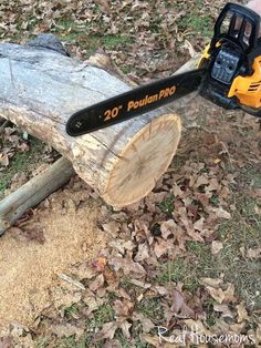 a person using a chainsaw to cut wood