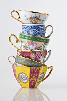 a stack of tea cups sitting on top of each other