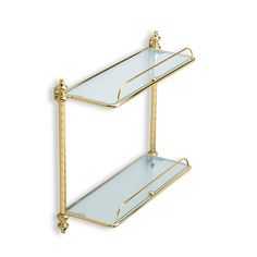 two tiered glass shelves with gold handles