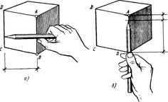 a drawing of a hand holding a piece of paper in front of an open box