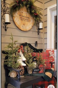 a christmas porch decorated for the holidays