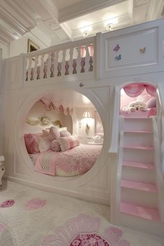 a white bunk bed with pink and white decor