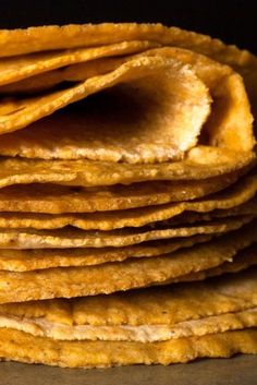 a stack of tortilla chips sitting on top of each other