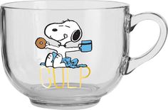 a glass cup with a cartoon character holding a donut