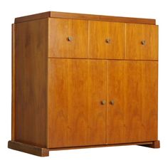 a wooden cabinet with four drawers on one side and two doors at the other end