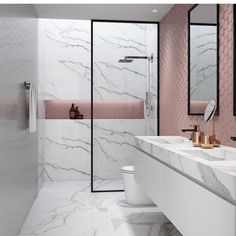 a bathroom with marble walls and flooring