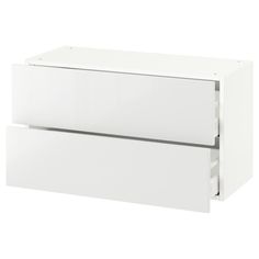 a white cabinet with two drawers on each side