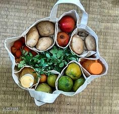 a bag filled with lots of different fruits and vegetables