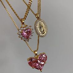 This necklace is the perfect mix of edgy and cute- a pink heart surrounded by crystal spikes Material: Gold-plated Copper, Cubic Zirconia Weight: 11.8g Size: 18 inches with a 3 inch adjustor Jewelry Accessories Ideas, Dope Jewelry, Girly Accessories, Jewelry Fashion Trends, Classy Jewelry, Fancy Jewellery, Pink Jewelry, Funky Jewelry, Jewelry Lookbook