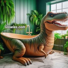 an inflatable dinosaur bathtub sitting on the floor next to potted plants