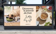 a billboard with a dog eating out of it's bowl