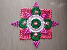 Siddhis rangoli art Square Rangoli Design Easy, Makar Sankranti Rangoli, Haldi Kunku, Unique Rangoli Designs, Rangoli Photos, Rangoli For Beginners, Colourful Rangoli, Simple Photos, Easy Rangoli Designs Videos