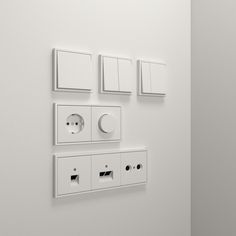 there are four electrical outlets on the wall