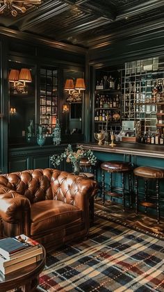 a living room filled with furniture and a bar