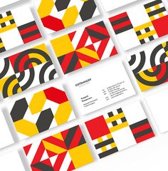 business cards designed to look like abstract shapes and lines, all in yellow, red, black, and white