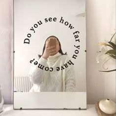 a woman taking a selfie in front of a mirror with the words do you see how far she is?