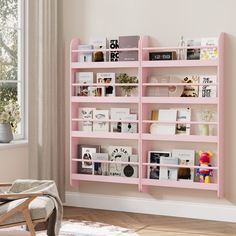 a pink book shelf with books on it