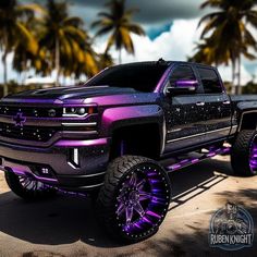 a purple truck parked in front of palm trees