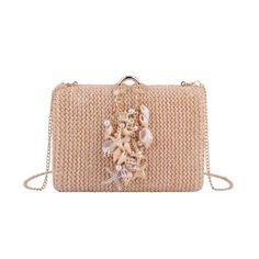 Dive into summer elegance with our Raffia Clutch featuring assorted seashell accents and a stylish chain crossbody strap. This beach-inspired accessory combines the natural charm of raffia with the whimsy of assorted seashells, creating a unique and fashionable statement piece. The chic chain crossbody strap adds a touch of modern flair, making it a versatile companion for both casual outings and special occasions. Embrace the coastal vibes and elevate your style with this one-of-a-kind clutch, Elegant Rectangular Straw Bag With Chain Strap, Rectangular Straw Bag With Chain Strap For Vacation, Woven Straw Bag As Fashion Accessory, Summer Rectangular Straw Bag With Chain Strap, Summer Straw Bag With Chain Strap, Summer Beige Straw Bag With Chain Strap, Summer Beach Straw Bag With Chain Strap, Elegant Straw Beach Bag, Summer Vacation Straw Bag With Chain Strap