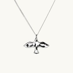 To celebrate our 10-year anniversary of our iconic "The Dove" necklace, we are excited to introduce a new, exclusive edition of the necklace. This reimagined piece keeps the beloved silhouette of the original, but crafted with our signature organic, uneven surface that catches the light and illuminates its details."The Dove" is more than just a piece of jewelry; it carries with it a message of hope, serving as a reminder that peace is always within reach.Measurement: Dove mm X 16 mm.Material: St Dove Bracelet, Dove Necklace, Hope Necklace, The Dove, Message Of Hope, Mors Dag, Silver Heart Necklace, Designer Gifts, Mens Accessories Fashion