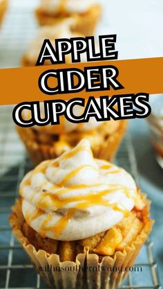 apple cider cupcakes on a cooling rack with caramel drizzle