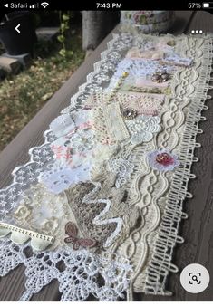 an old lace table runner on a picnic table