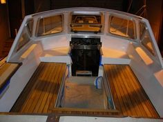 the inside of a boat with its doors open