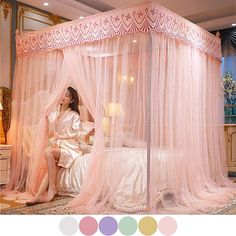 a woman is sitting in a bed with pink curtains on the headboard and foot board