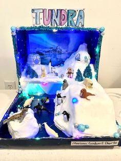 there is a display in the shape of a winter scene