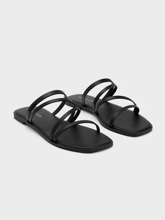 Bridesmaid Shoes Flat Black, Chic Black Open Toe Footbed Sandals, Black Toe Ring Sandals For Spring Vacation, Sleek Open Toe Slides For Summer, Chic Black Footbed Sandals For Vacation, Sleek Black Flat Sandals, Trendy Black Mules For Vacation, Modern Black Flat Sandals, Casual Black Toe Ring Sandals For Vacation